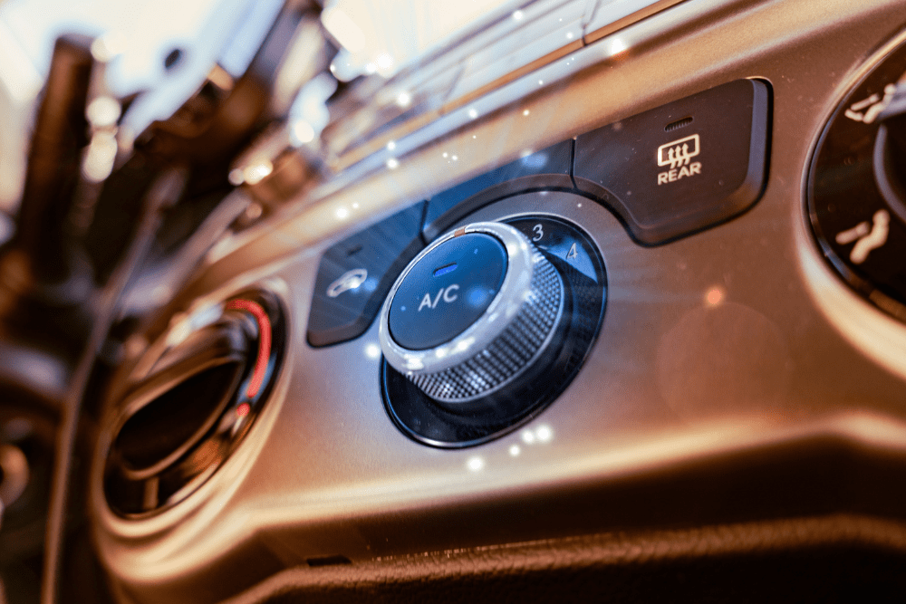 car a/c repair, auto repair in Englewood, CO at Autovisions. Close-up view of a vehicle’s A/C control dial set to cool.