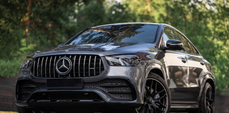 mercedes repair and service, auto repair in Englewood, CO at Autovisions. Image of a sleek Mercedes-Benz SUV parked outdoors.